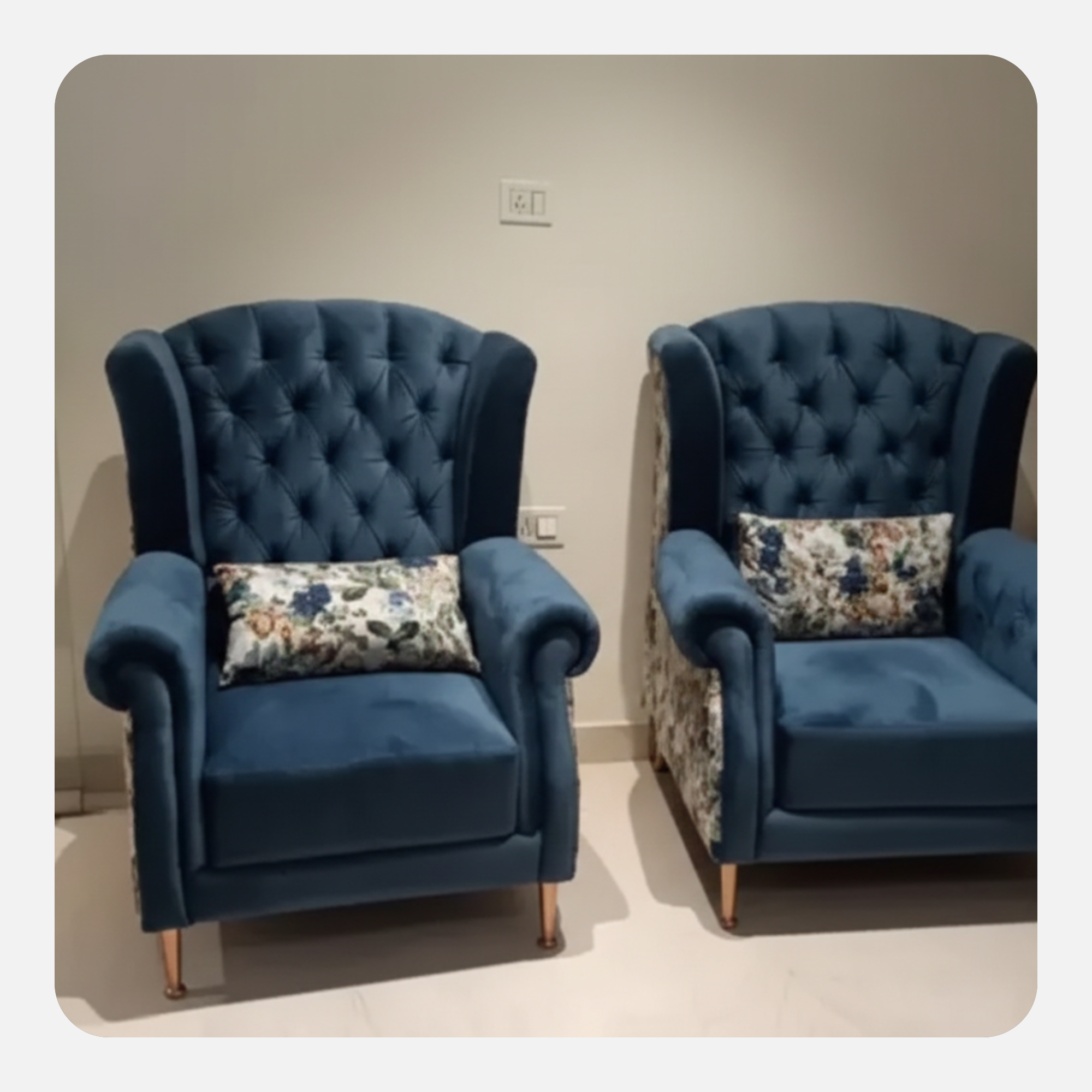 luxury tufted armchair with cushioned seat and wooden legs